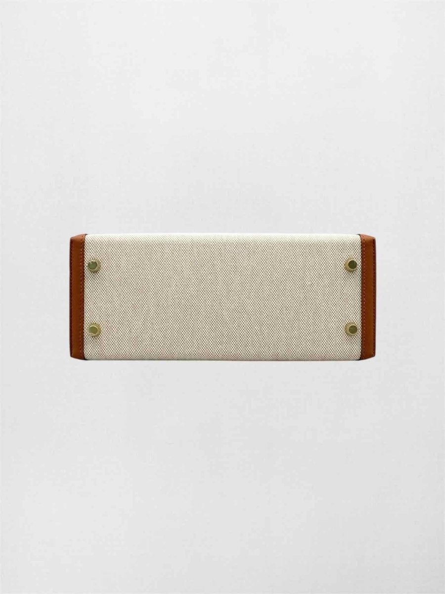 Pre-loved HERMES Kelly Sellier Ecru Gold Top Handle at Reems Closet