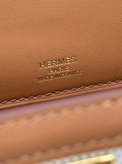 Pre-loved HERMES Kelly Sellier Ecru Gold Top Handle at Reems Closet