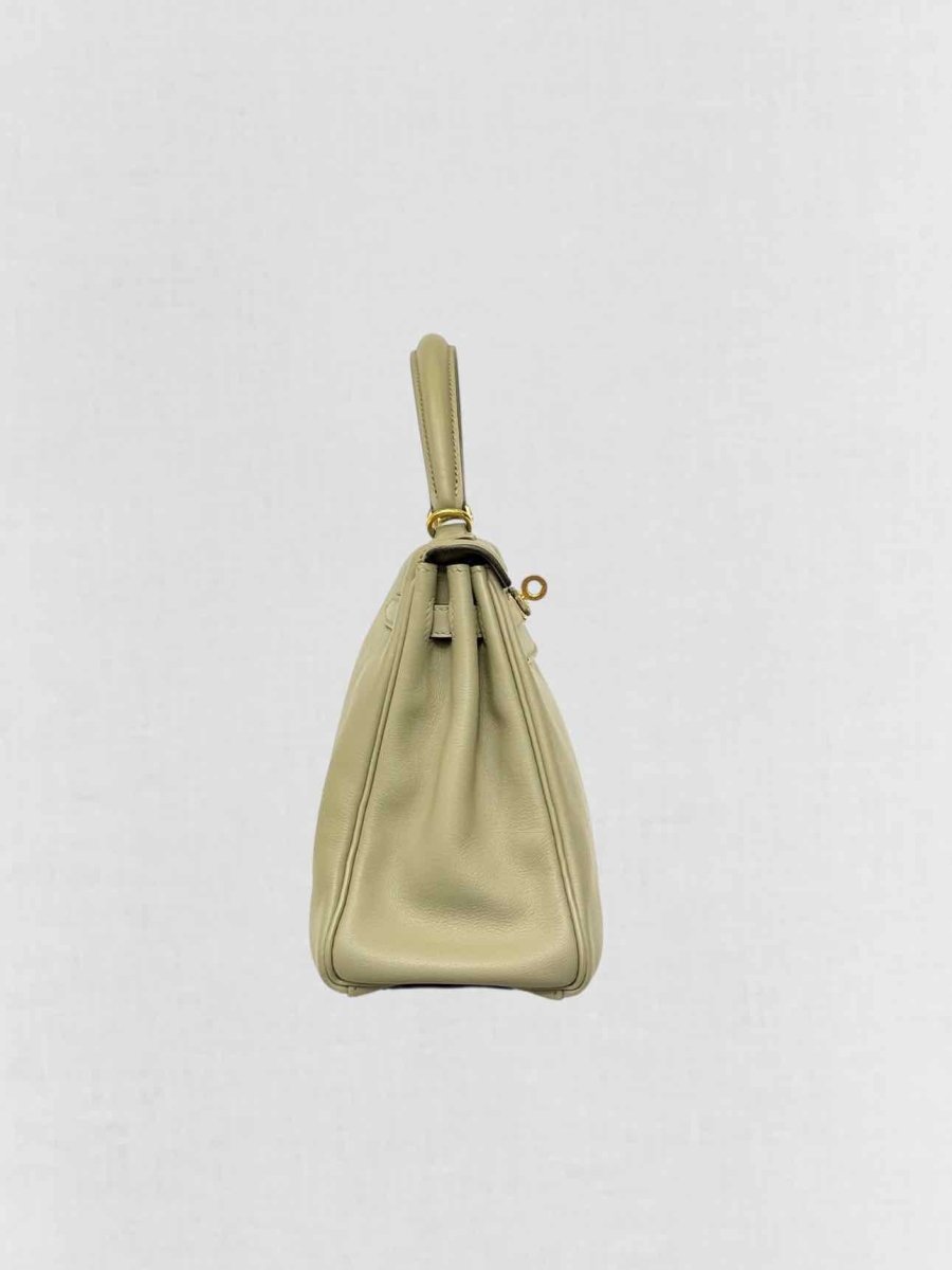 Pre - loved HERMES Kelly Vert Fizz Top Handle at Reems Closet