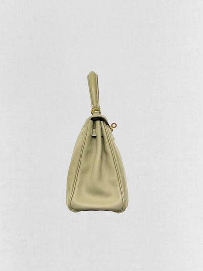 Pre - loved HERMES Kelly Vert Fizz Top Handle at Reems Closet