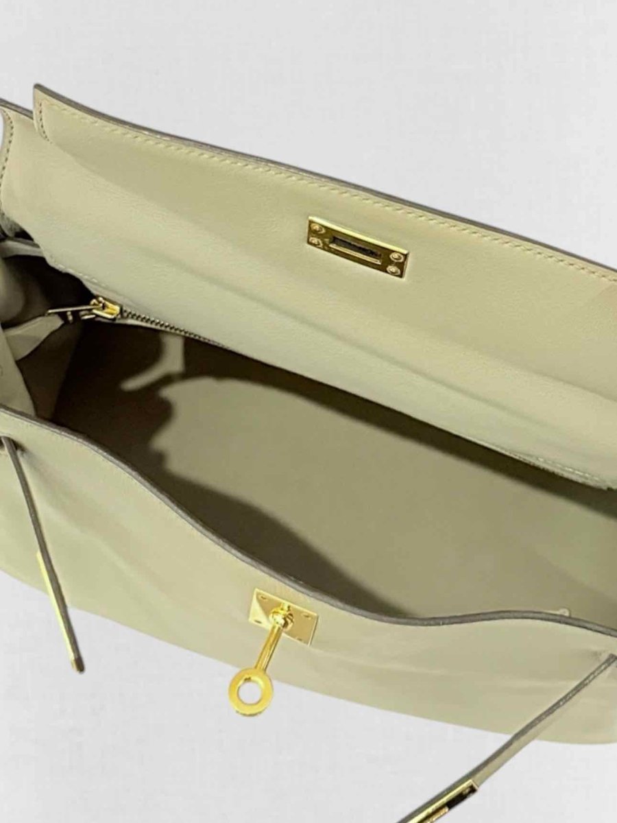 Pre - loved HERMES Kelly Vert Fizz Top Handle at Reems Closet