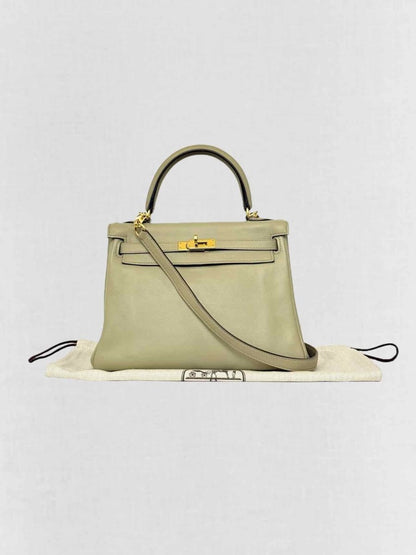 Pre - loved HERMES Kelly Vert Fizz Top Handle at Reems Closet