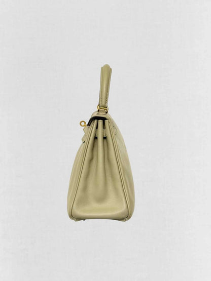 Pre - loved HERMES Kelly Vert Fizz Top Handle at Reems Closet