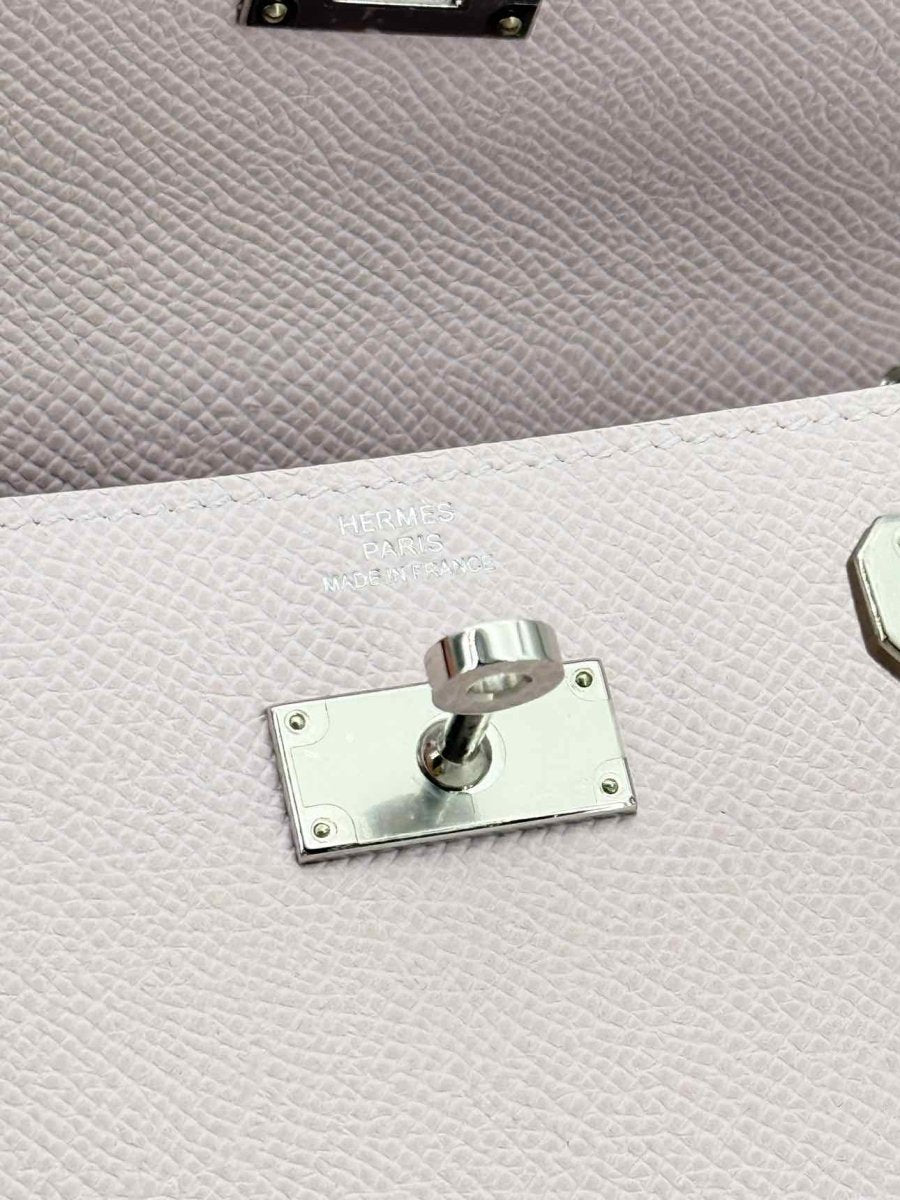 Pre - loved HERMES Mauve Sylvestre Continental Wallet at Reems Closet