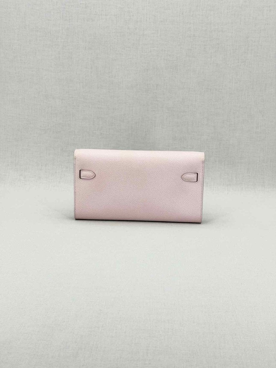 Pre - loved HERMES Mauve Sylvestre Continental Wallet at Reems Closet
