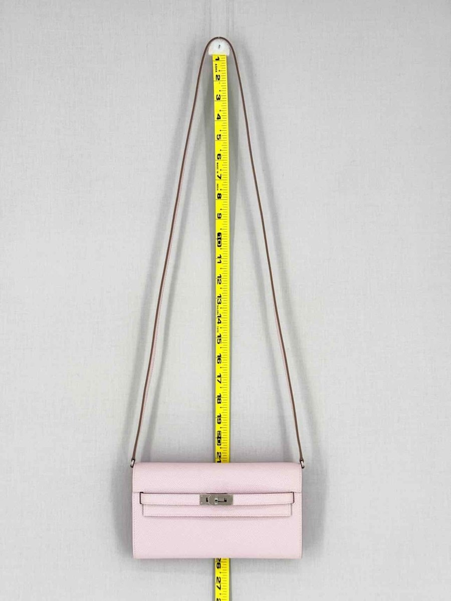 Pre - loved HERMES Mauve Sylvestre Continental Wallet at Reems Closet