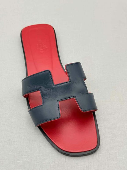 Pre-loved HERMES ORAN Black Size EU 39 Sandals at Reems Closet