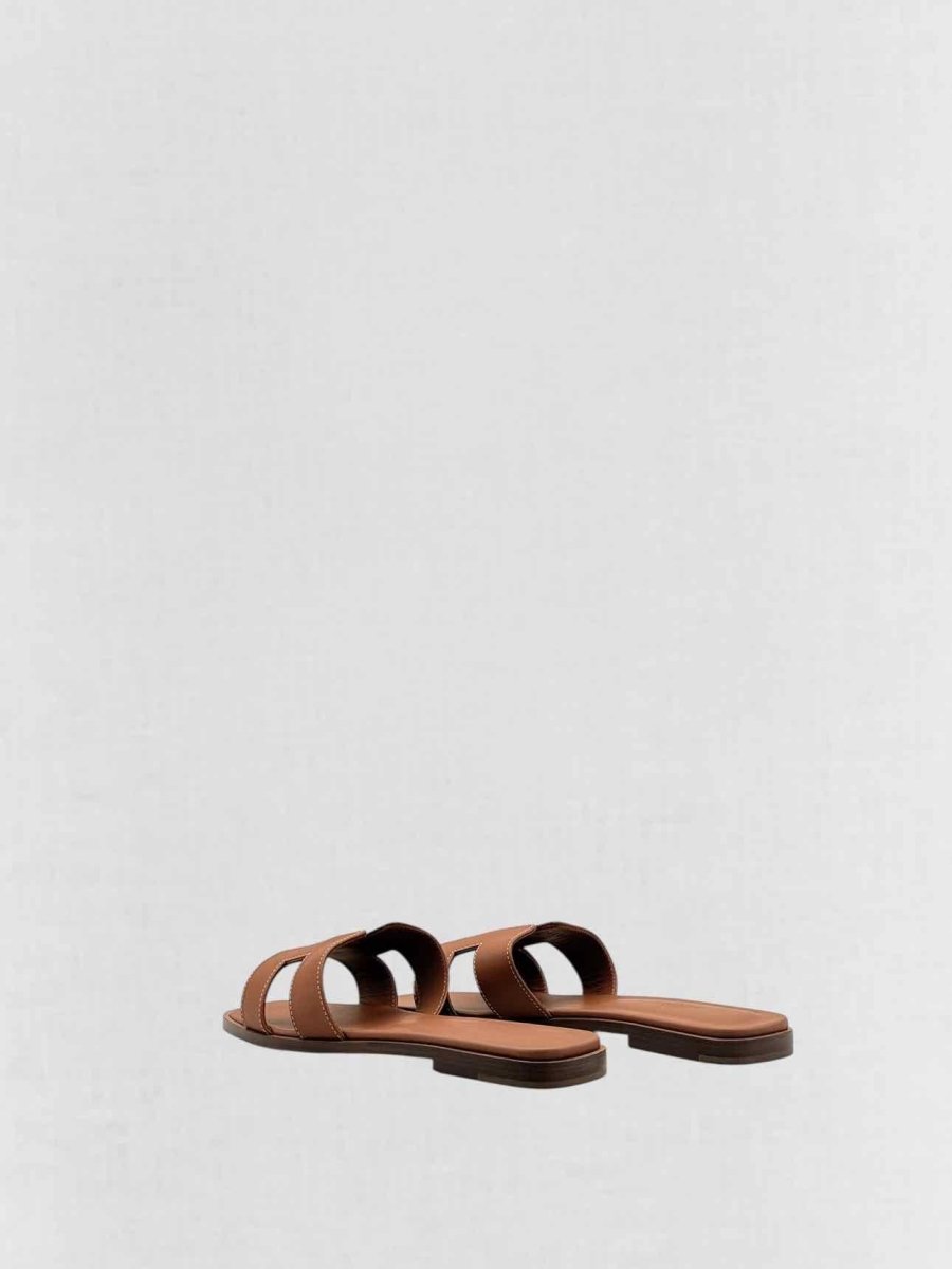 Pre - loved HERMES ORAN Gold Size EU 37.5 Sandals at Reems Closet