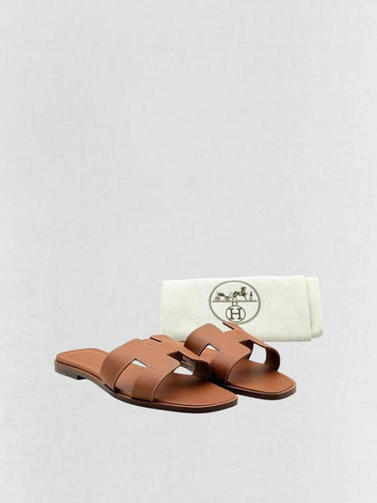 Pre - loved HERMES ORAN Gold Size EU 37.5 Sandals at Reems Closet