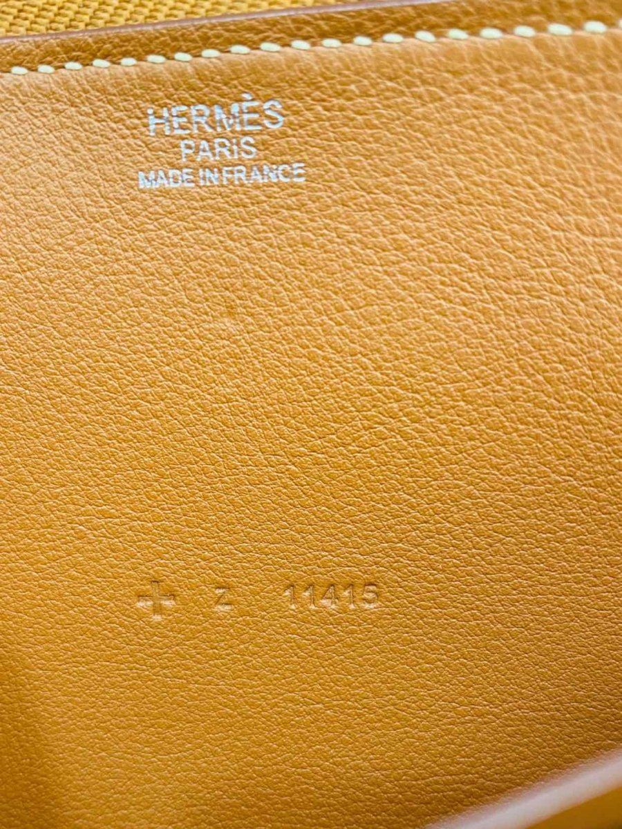 Pre - loved HERMES Silk'In Gold Continental Wallet at Reems Closet