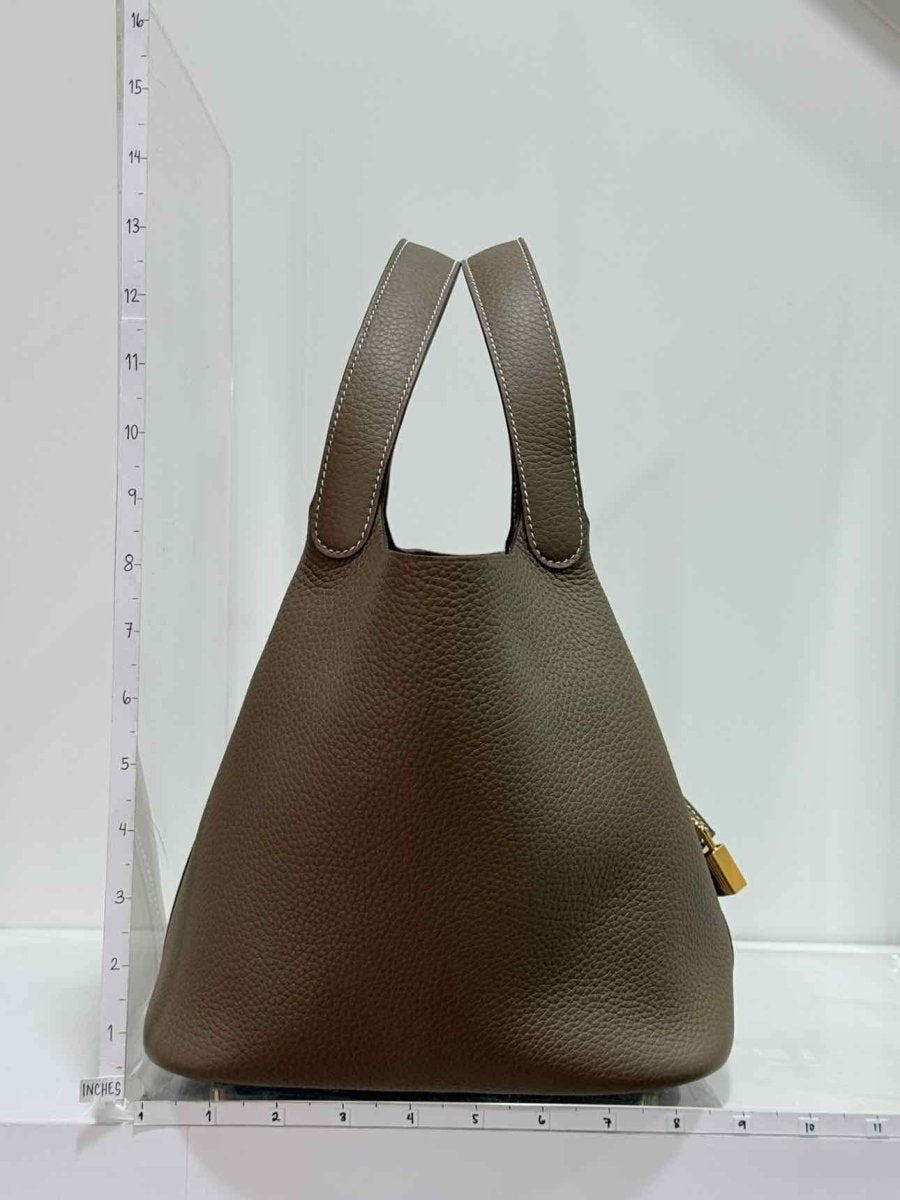 Pre-loved HERMES Top Handle at Reems Closet