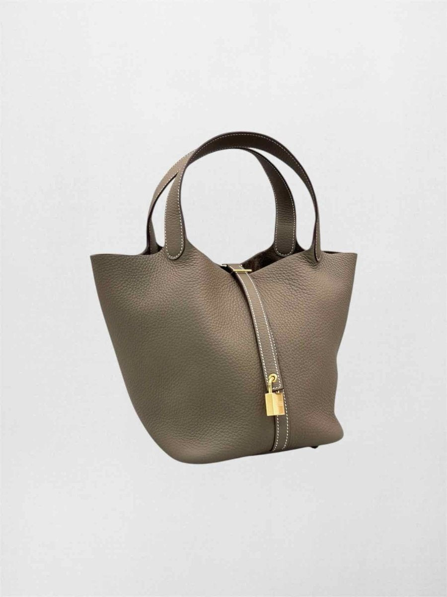 Pre-loved HERMES Top Handle at Reems Closet
