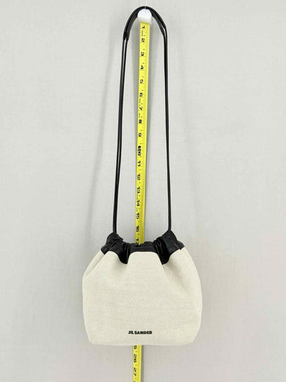 Pre - loved JIL SANDER Drawstring Beige & Black Bucket Bag at Reems Closet