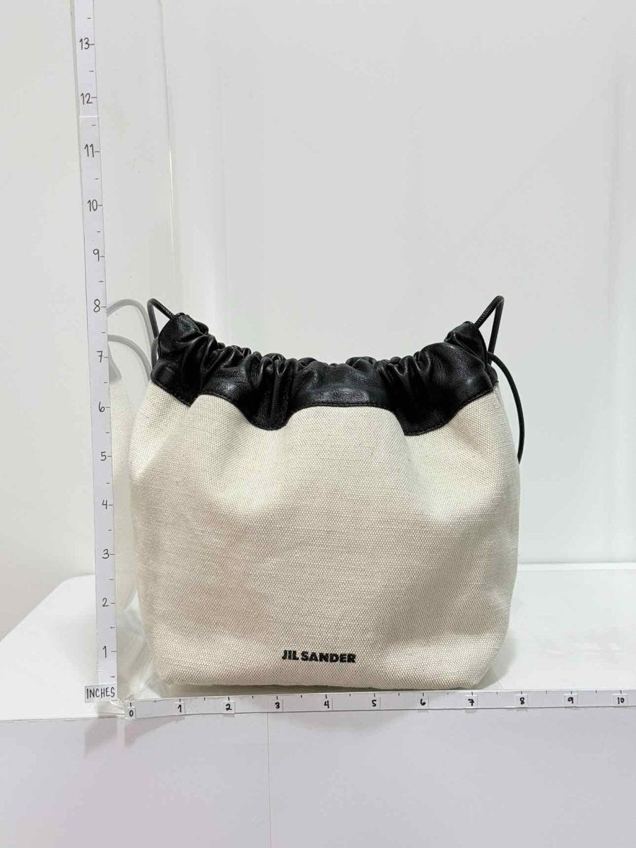 Pre - loved JIL SANDER Drawstring Beige & Black Bucket Bag at Reems Closet