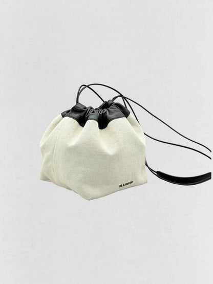 Pre - loved JIL SANDER Drawstring Beige & Black Bucket Bag at Reems Closet