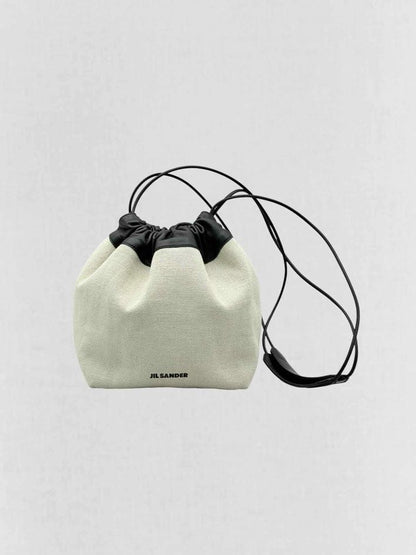 Pre - loved JIL SANDER Drawstring Beige & Black Bucket Bag at Reems Closet