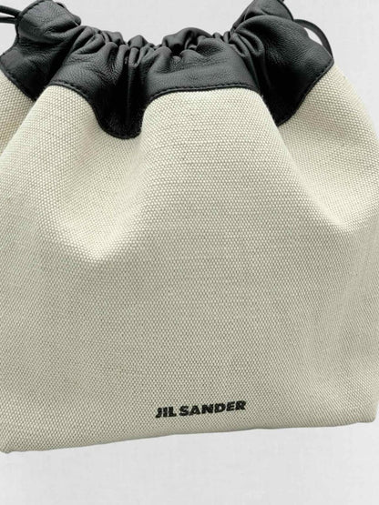 Pre - loved JIL SANDER Drawstring Beige & Black Bucket Bag at Reems Closet