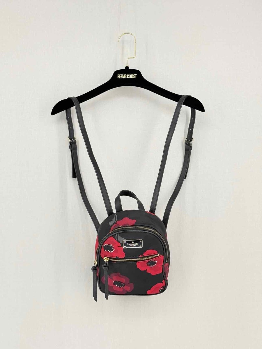 Pre - loved KATE SPADE Bradley Wilson Road Black Poppy Backpack at Reems Closet