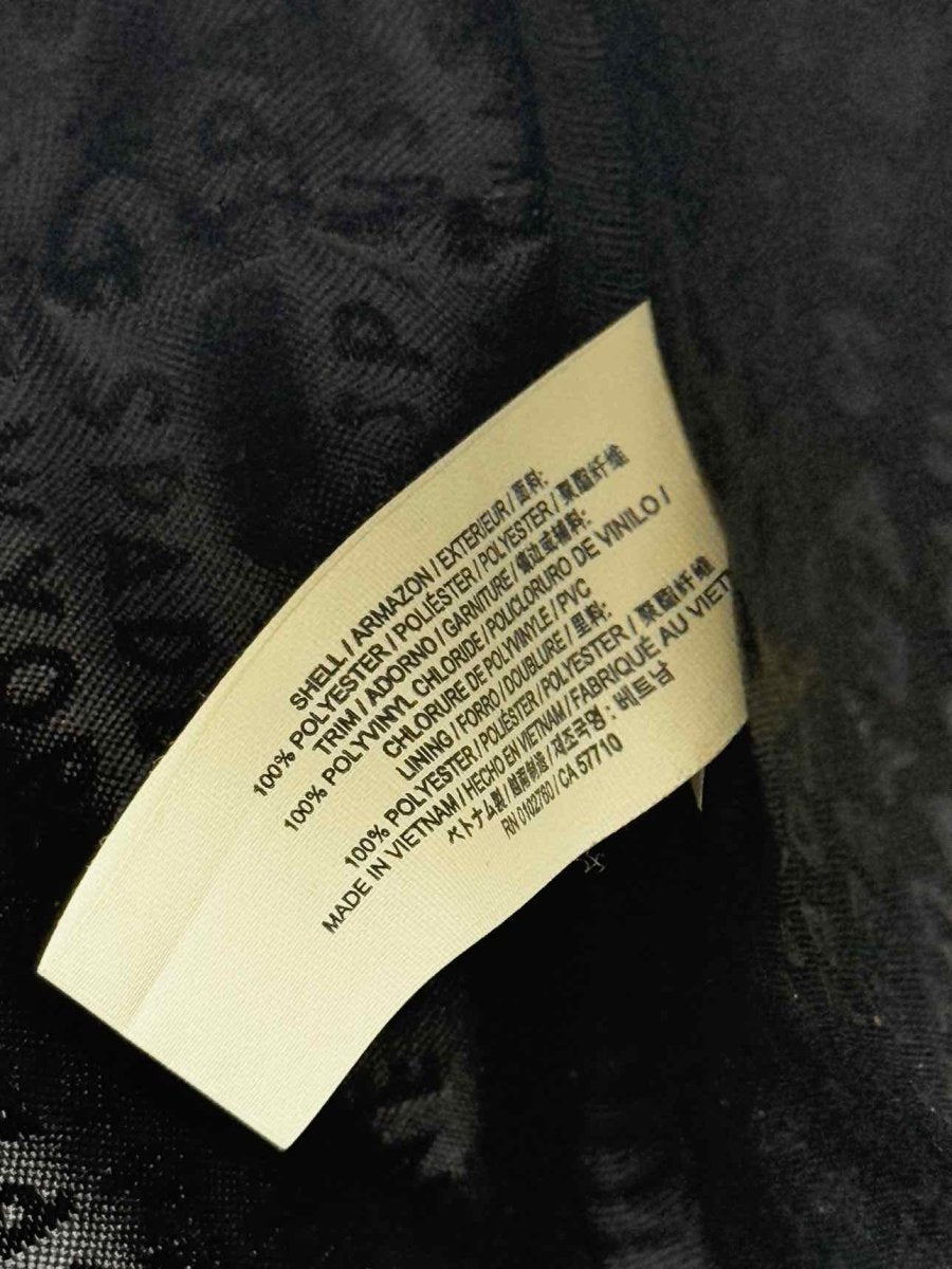 Pre - loved KATE SPADE Bradley Wilson Road Black Poppy Backpack at Reems Closet