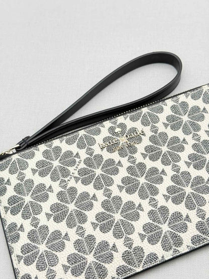 Pre - loved KATE SPADE Lucy White & Black Spade Flower Wristlet at Reems Closet