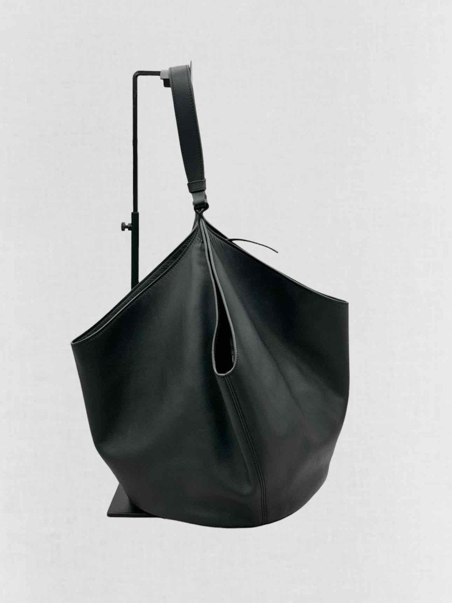 Pre - loved KHAITE Lotus Black Tote Bag at Reems Closet