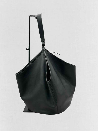 Pre - loved KHAITE Lotus Black Tote Bag at Reems Closet