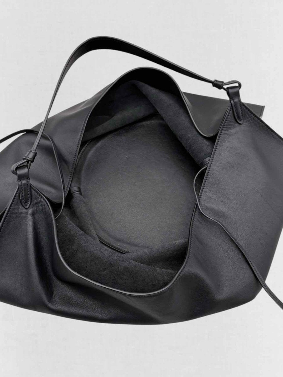 Pre - loved KHAITE Lotus Black Tote Bag at Reems Closet