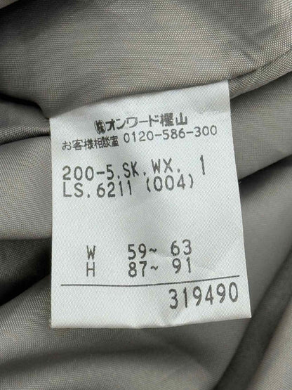 Pre-loved KUMIKYOKU Grey Back Size Medium Knee Length Skirt at Reems Closet