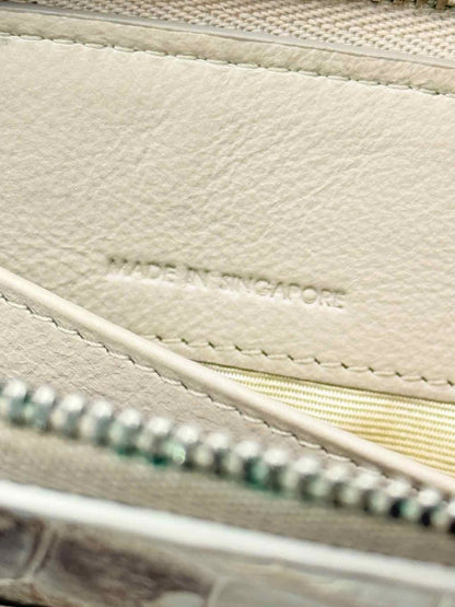 Pre-loved KWANPEN White & Brwon Continental Wallet at Reems Closet