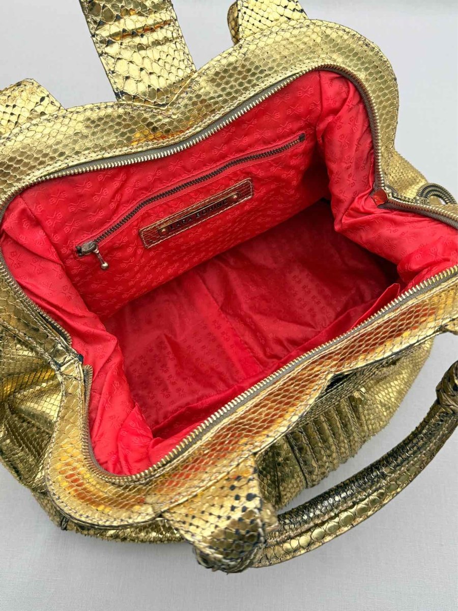 Pre-loved LARA BOHINC Lunar Eclipse Metallic Gold Top Handle at Reems Closet