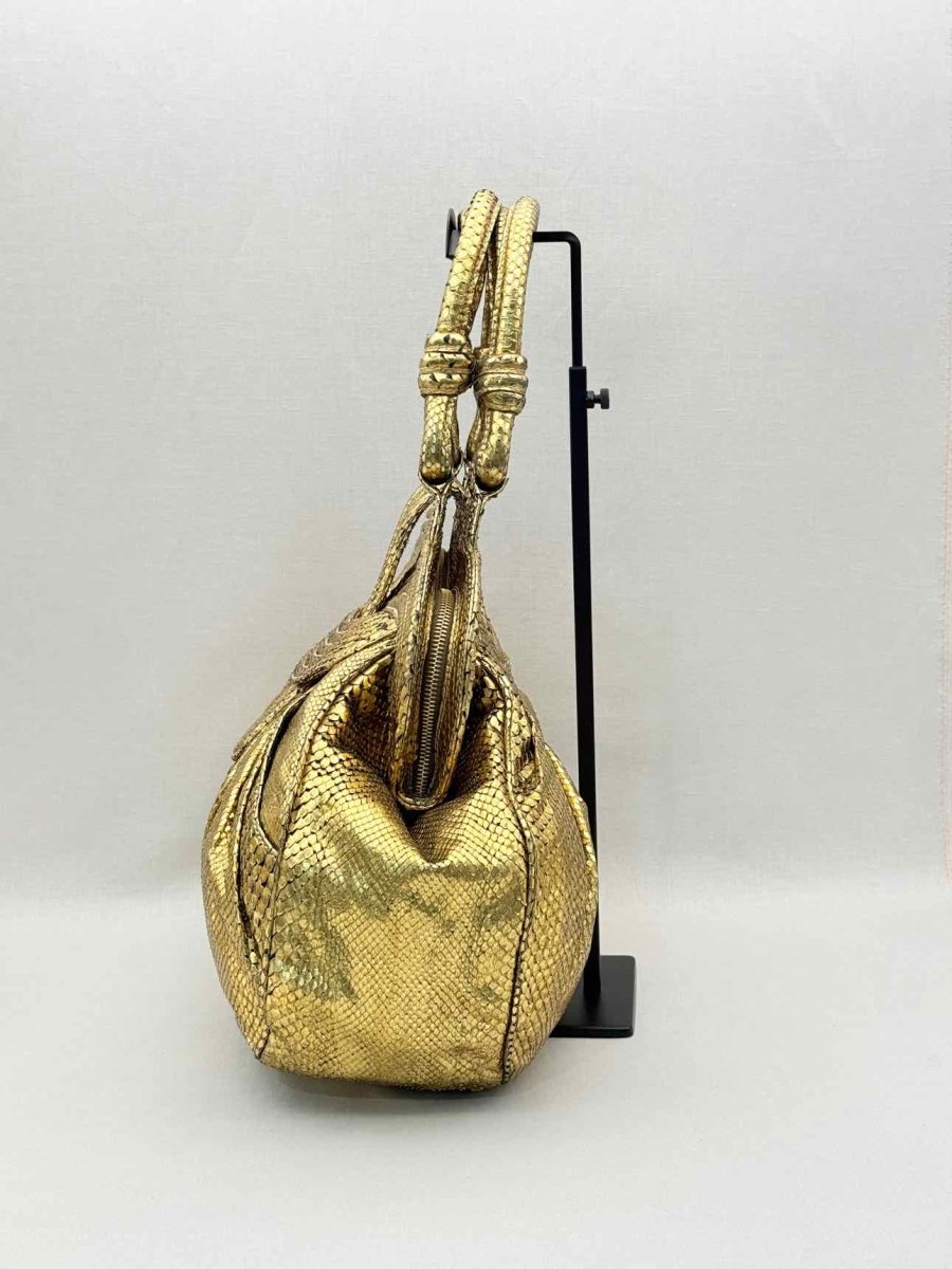 Pre-loved LARA BOHINC Lunar Eclipse Metallic Gold Top Handle at Reems Closet