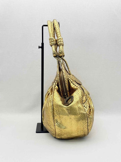 Pre-loved LARA BOHINC Lunar Eclipse Metallic Gold Top Handle at Reems Closet