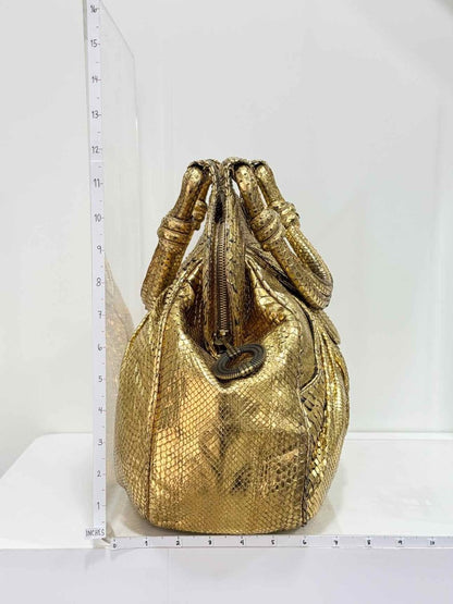 Pre-loved LARA BOHINC Lunar Eclipse Metallic Gold Top Handle at Reems Closet