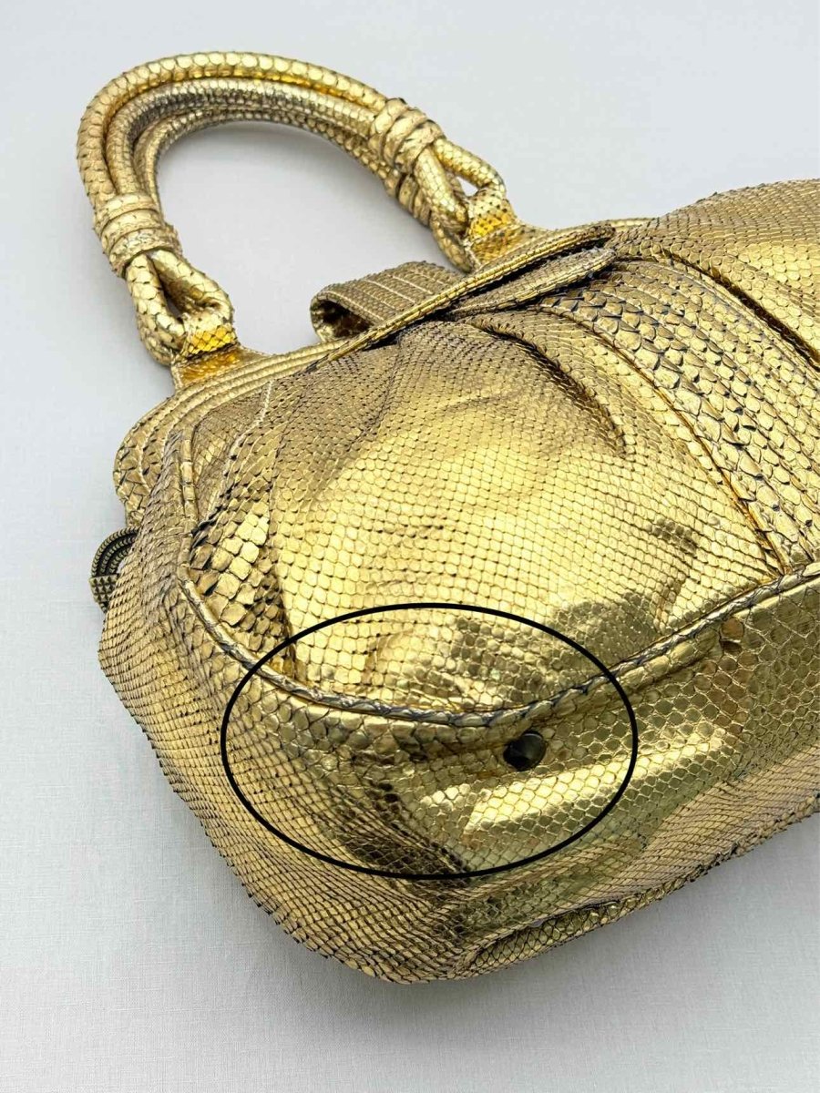Pre-loved LARA BOHINC Lunar Eclipse Metallic Gold Top Handle at Reems Closet