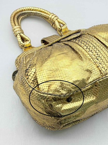 Pre-loved LARA BOHINC Lunar Eclipse Metallic Gold Top Handle at Reems Closet