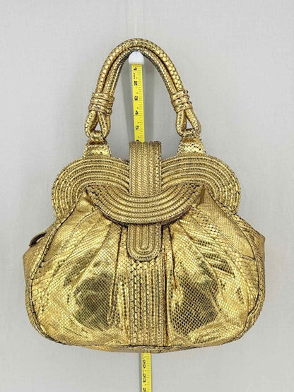 Pre-loved LARA BOHINC Lunar Eclipse Metallic Gold Top Handle at Reems Closet