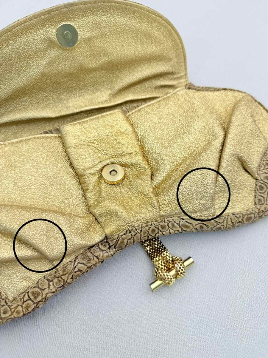 Pre-loved LARA BOHINC Metallic Gold Clutch at Reems Closet