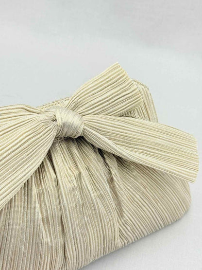 Pre - loved LOEFFLER RANDALL Bow Gold Clutch at Reems Closet