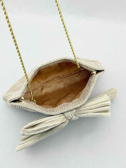 Pre - loved LOEFFLER RANDALL Bow Gold Clutch at Reems Closet