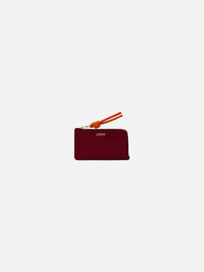 Pre - loved LOEWE Knot Burgundy Continental Wallet at Reems Closet