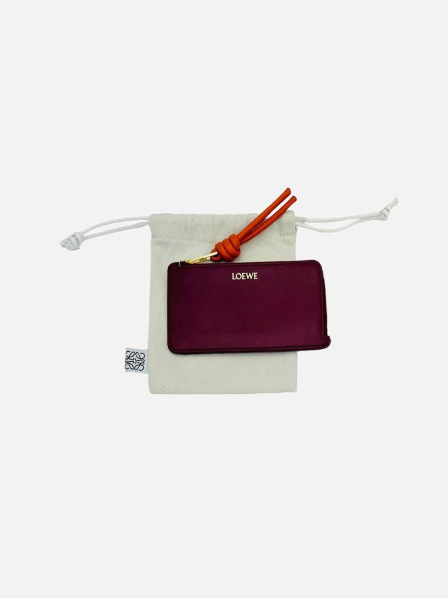 Pre - loved LOEWE Knot Burgundy Continental Wallet at Reems Closet