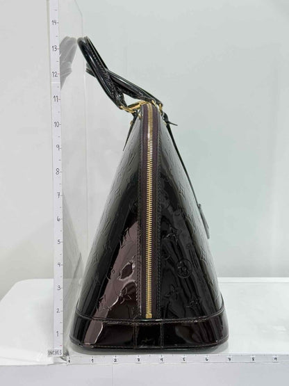 Pre-loved LOUIS VUITTON Alma Amarante Monogram Top Handle at Reems Closet