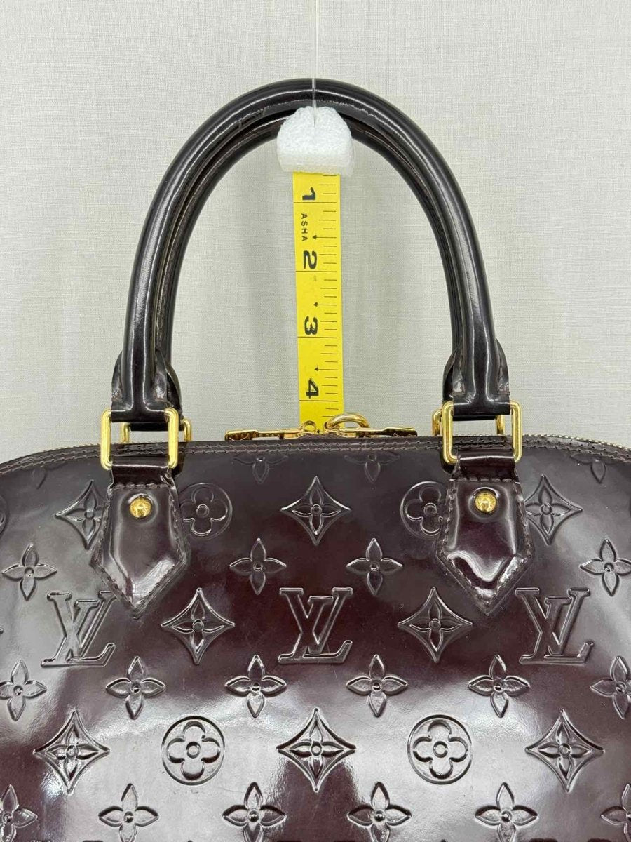 Pre-loved LOUIS VUITTON Alma Amarante Monogram Top Handle at Reems Closet