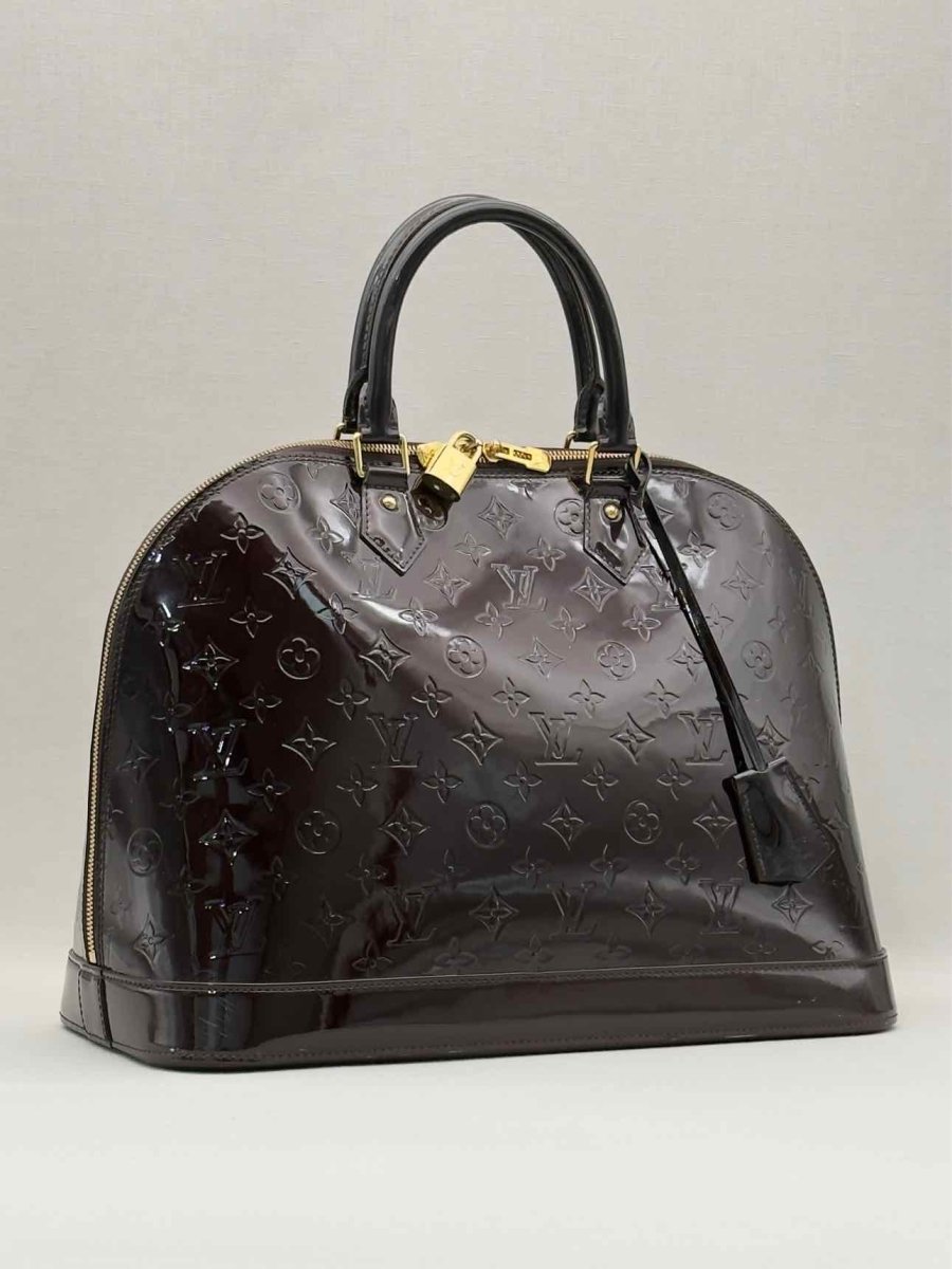 Pre-loved LOUIS VUITTON Alma Amarante Monogram Top Handle at Reems Closet