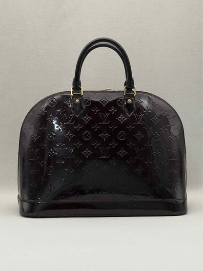Pre-loved LOUIS VUITTON Alma Amarante Monogram Top Handle at Reems Closet