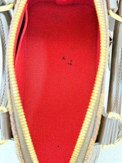 Pre - loved LOUIS VUITTON Alma Brown Damier Ebene Top Handle at Reems Closet