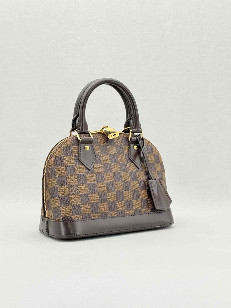 Pre - loved LOUIS VUITTON Alma Brown Damier Ebene Top Handle at Reems Closet