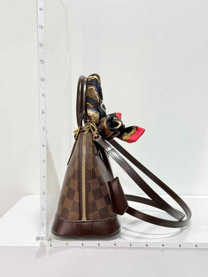 Pre - loved LOUIS VUITTON Alma Brown Damier Ebene Top Handle at Reems Closet