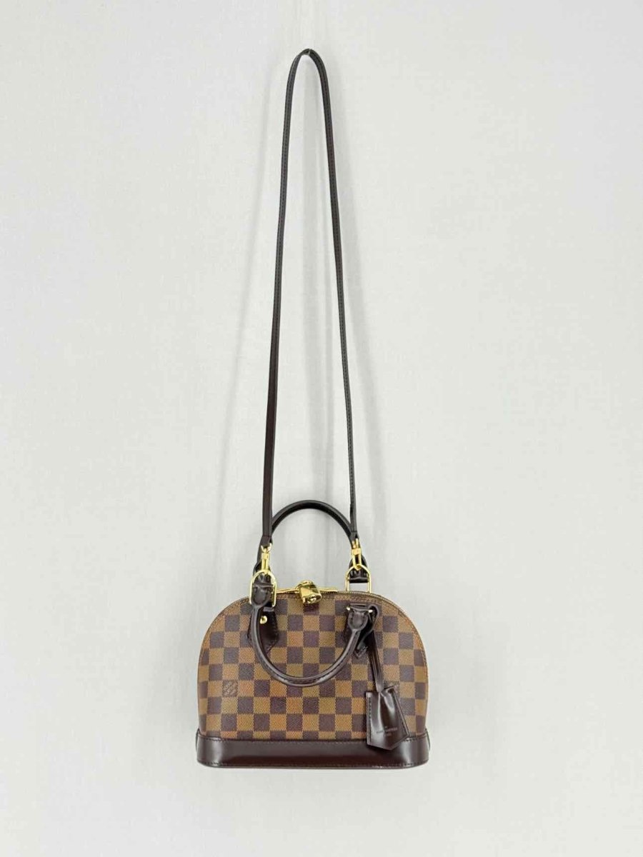 Pre - loved LOUIS VUITTON Alma Brown Damier Ebene Top Handle at Reems Closet