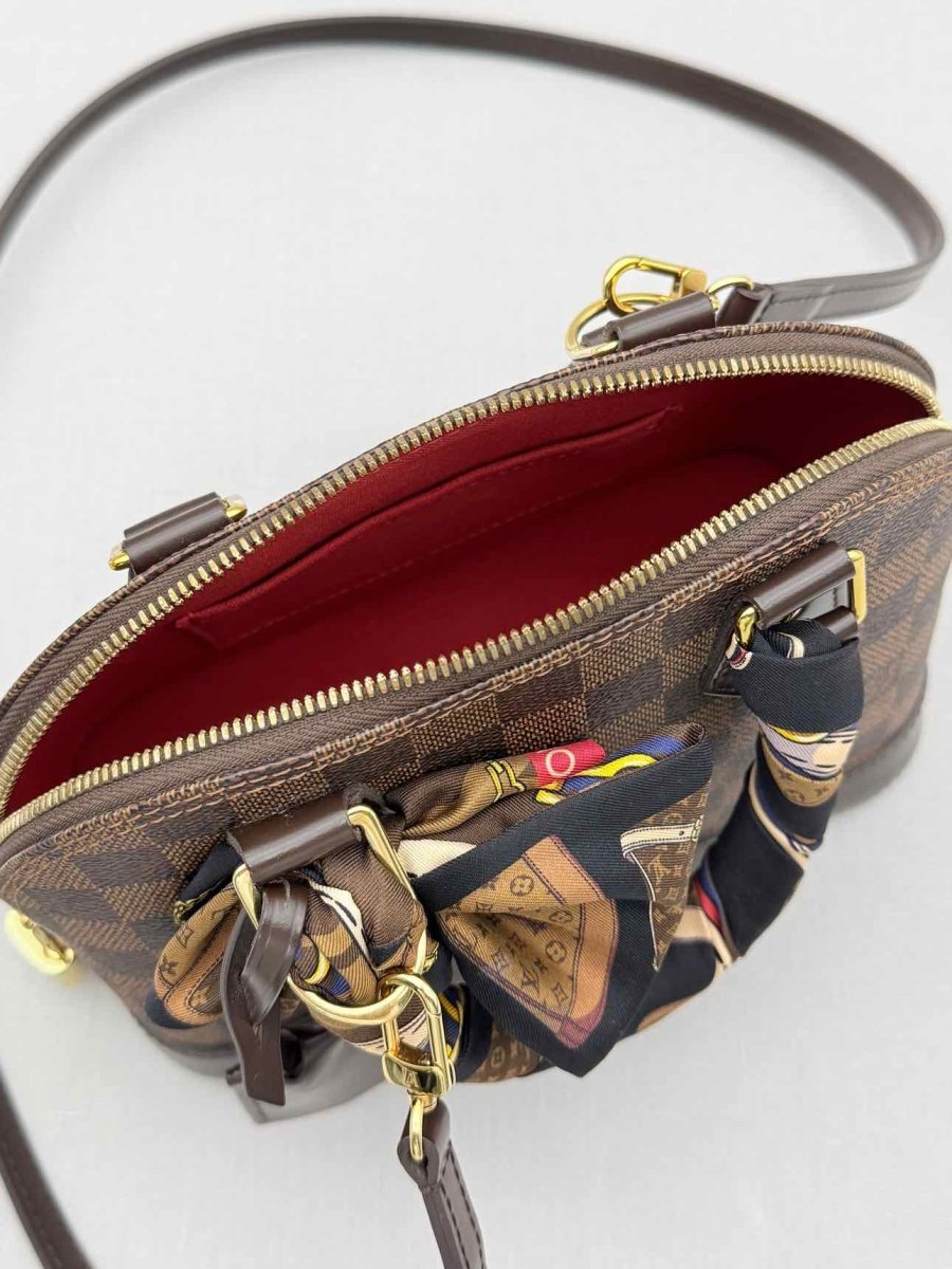 Pre - loved LOUIS VUITTON Alma Brown Damier Ebene Top Handle at Reems Closet